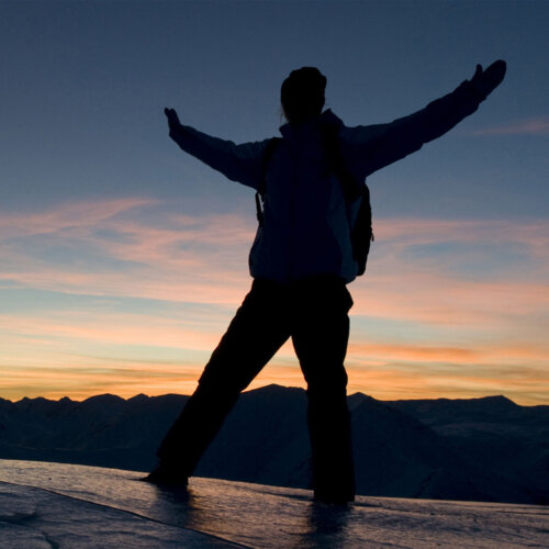 Ben Nevis at night - Image of a person celebrating at the top of Ben Nevis