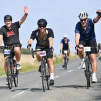London to Brighton Cycle Ride - Image of people riding bikes looking happy