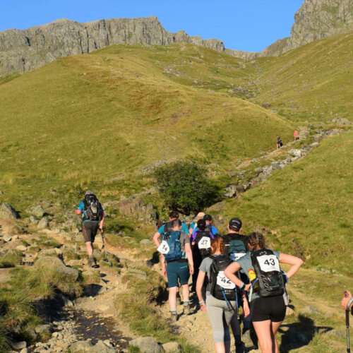 National 3 peaks - Image of walkers following a path up a mountain