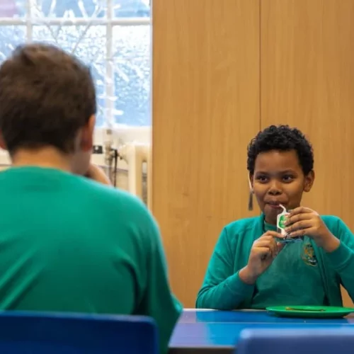 2 boys enjoying a break at school