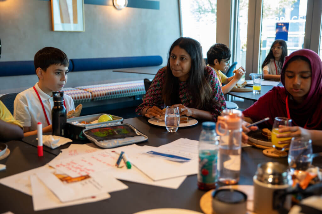 Image of a Deutsche Bank staff at a Magic Breakfast partner school.