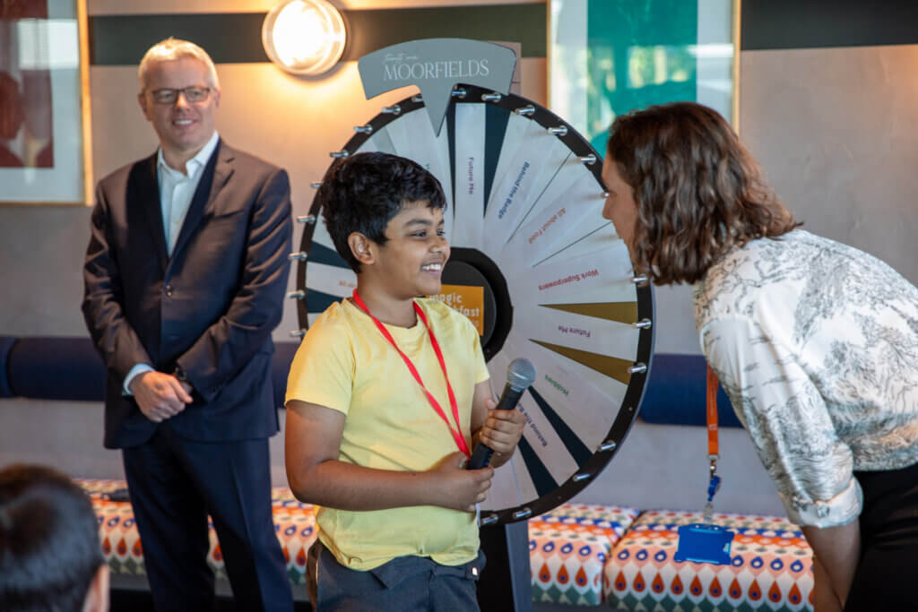Image of a Deutsche Bank staff at a Magic Breakfast partner school.