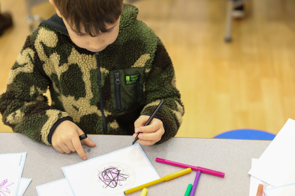 Image of child drawing