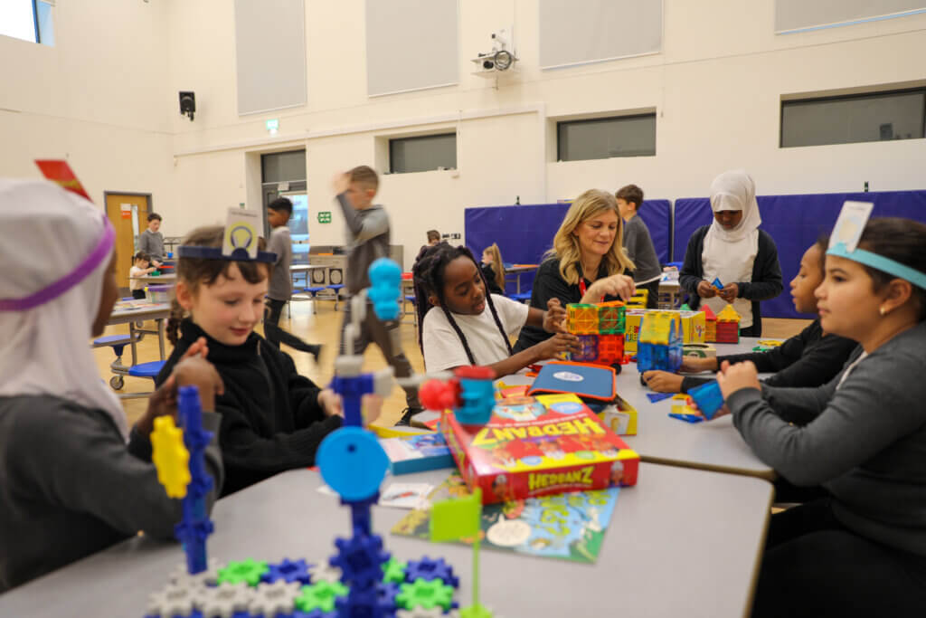 Image of children and partner volunteers at a Magic Makers event.