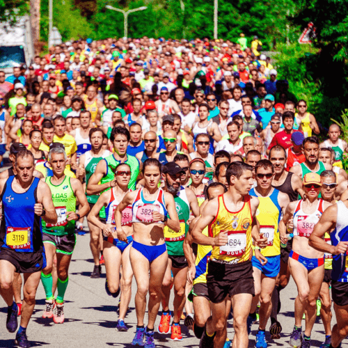 A picture with a large group of people running